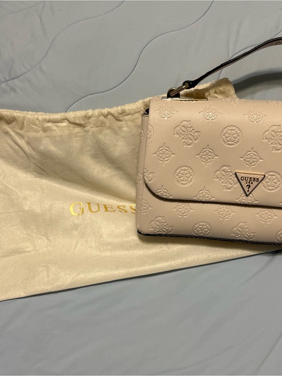Guess Handbags - GUESS Cream Embossed Logo Crossbody Bag